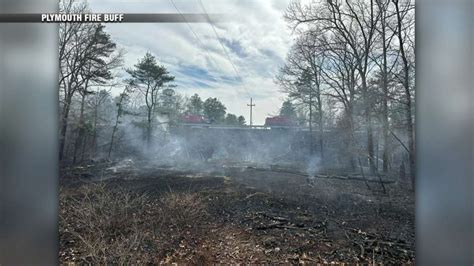 Crews battle brush fire in Plymouth